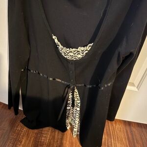 Black sweater with black/white details